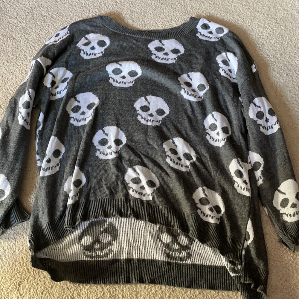 Skull asymmetrical sweater
